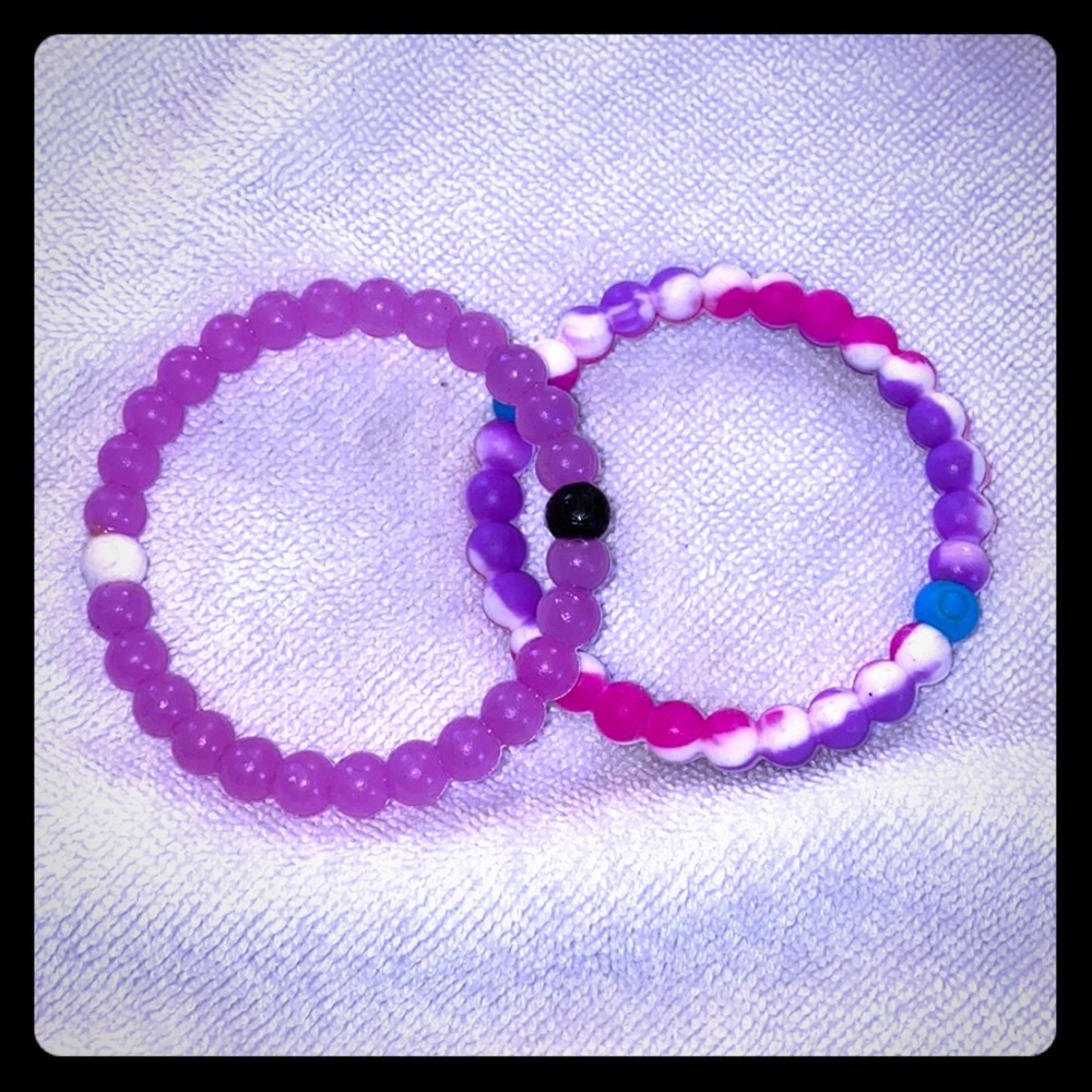 Two bracelets pink and purple Lokai style